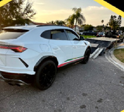 Exotic SUV on a Golden Falls & Associates LLC trailer